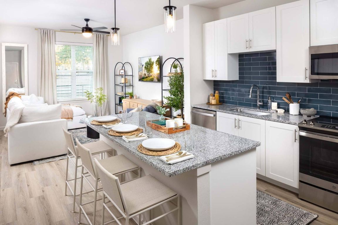 Experience seamless living with open-concept designs, merging kitchen and living spaces.