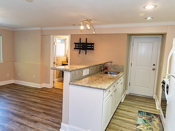 Living room (left side) and Kitchen