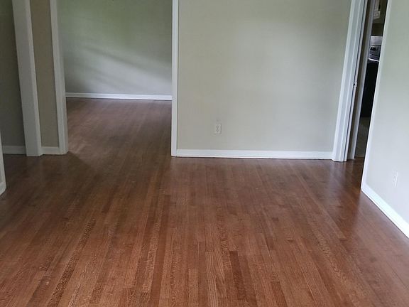 GREAT ROOM LOOKING IN TO DINING ROOM 