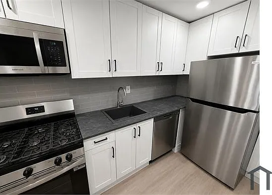 1322 S Newkirk St — Photo 4