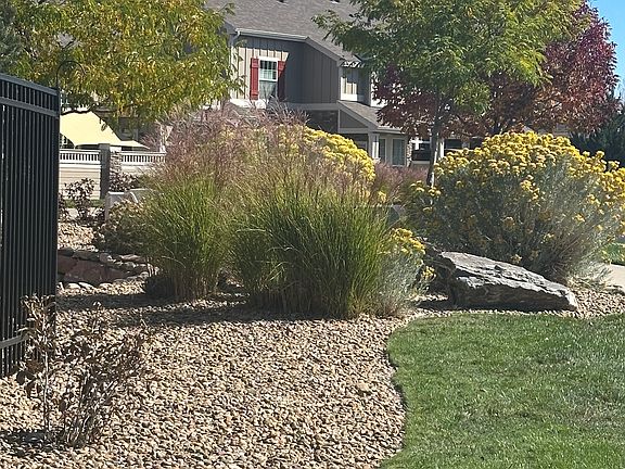 Landscaping maintained by HOA.