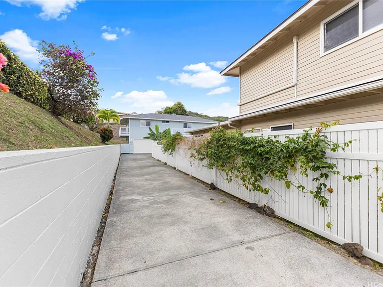 Driveway puts house away from the street.