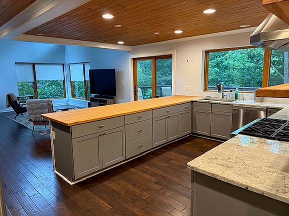 Spacious kitchen into living room.