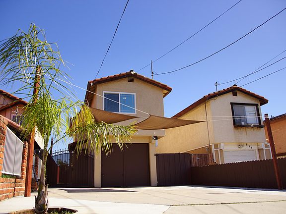 Street View, Queen palm trees to welcome you home!