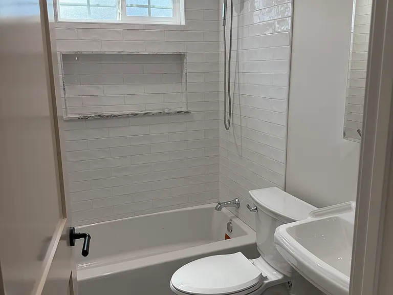 downstairs bathroom with marble checkered floors