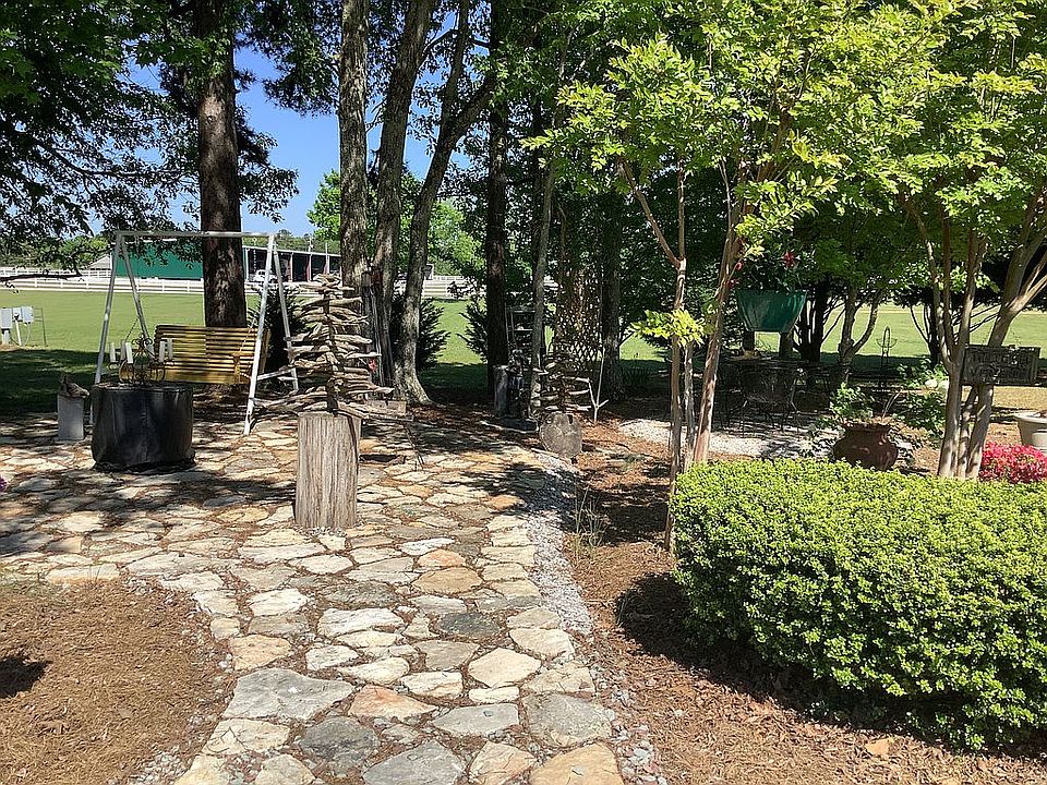 Side yard with stone patio