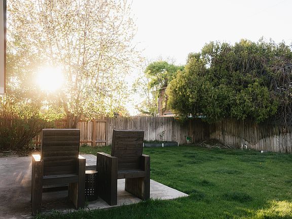 spacious backyard, large patio