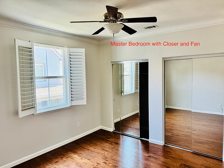 Master bed with dual closet and fan