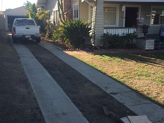 to detached garage , lots of parking space