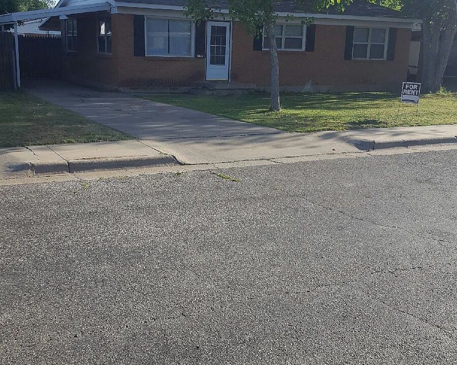 Brick home with carport