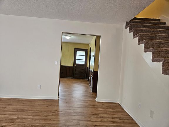 living room entrance to kitchen
back door to deck