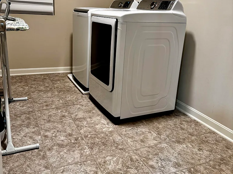 laundry room with included washer and dryer