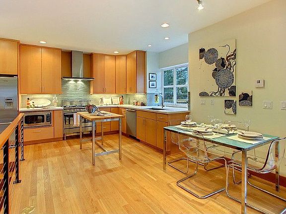 Custom Fir Cabinets, Modern Quartz Terrazo countertops, Glass Mosaic backsplash, Undermount Stainles