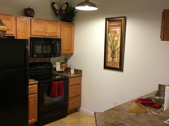 All appliances included: fridge, range, microwave, dishwasher, garbage disposal. Counter seating for two.