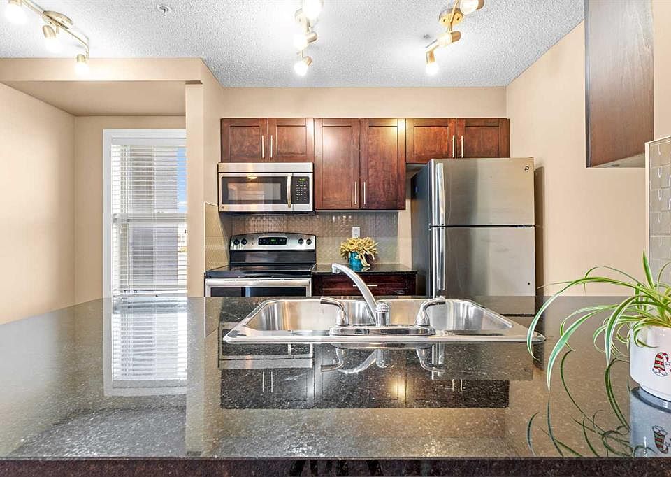 1st image of 403 W Mackenzie Way SW #7202