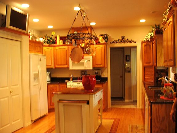 Great kitchen with plenty of cabinets, granite c/tops and large pantry