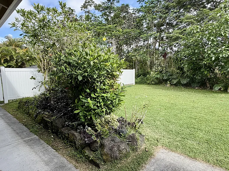 Sidewalk leads to fenced back yard- pet friendly
