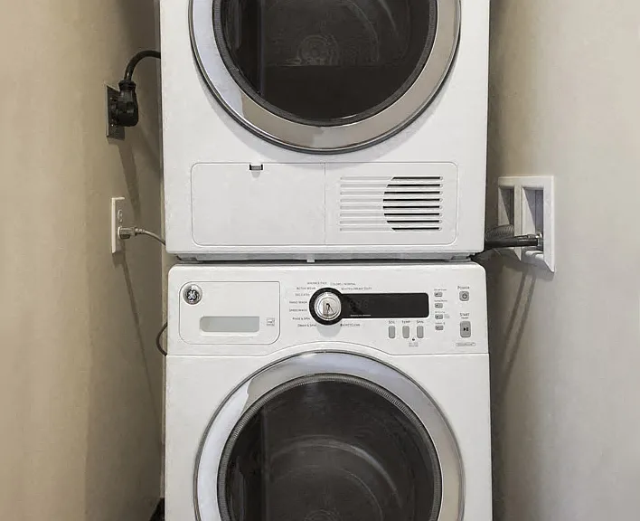 Stacked full-size GE washer and dryers