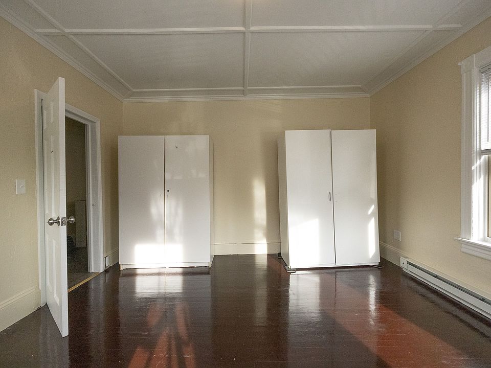 Third bedroom with freestanding wardrobe storage