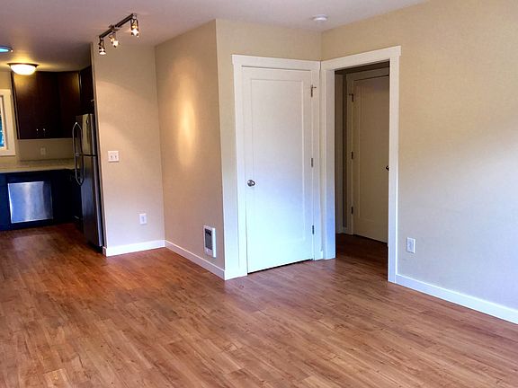 View into Kitchen and dining from front door.