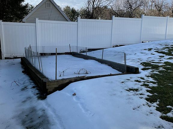 Deck overlooks garden. Optional shared garden between both tenants.