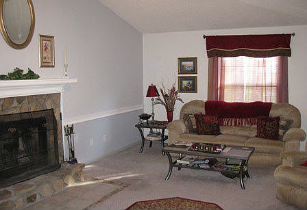 Living Room w/ Cathedral Ceiling