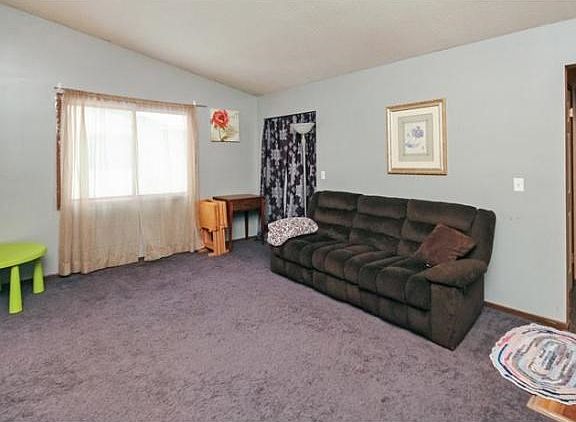 Note the storage closet in the living room - great way to store that extra stuff you don't want sitting out!