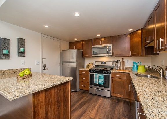 Newly remodeled kitchens with plenty of beautiful granite counter space