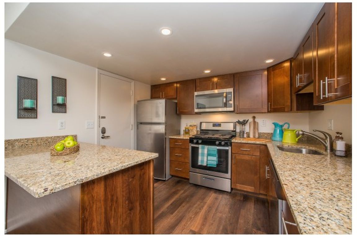 Newly remodeled kitchens with plenty of beautiful granite counter space