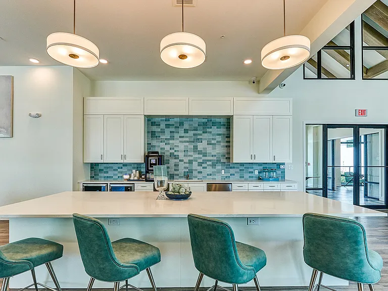 Imperial Crossing Luxury Apartment Homes community clubhouse seating area.