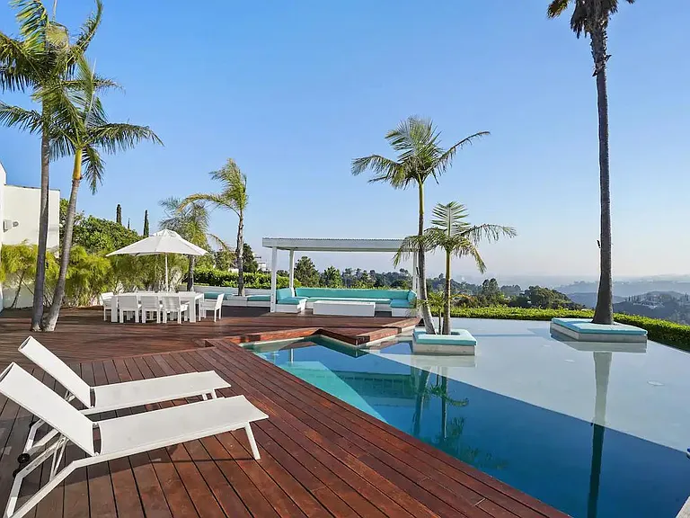 Lounging in luxury! Enjoy the California sun on the elegant sunbeds, where comfort meets style.