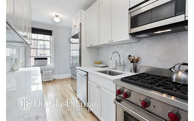 Sold by Douglas Elliman | media 13