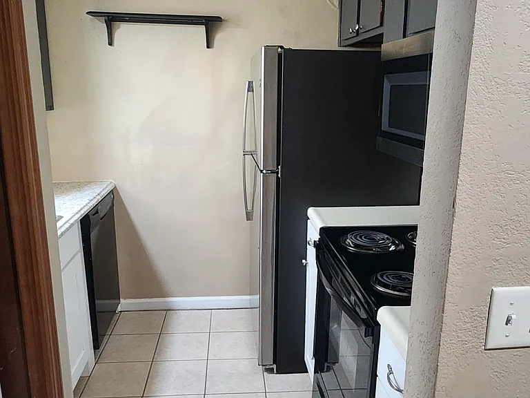 Kitchen new cabinets and Whirlpool appliances