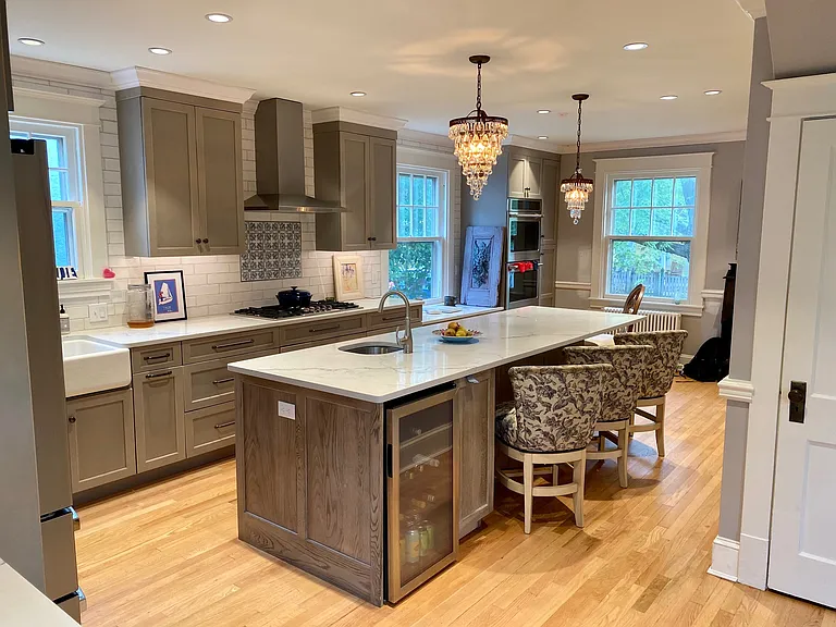 A five-burner gas cook top, double ovens, double refrigerators and two beverage coolers are a few of the upscale amenities.