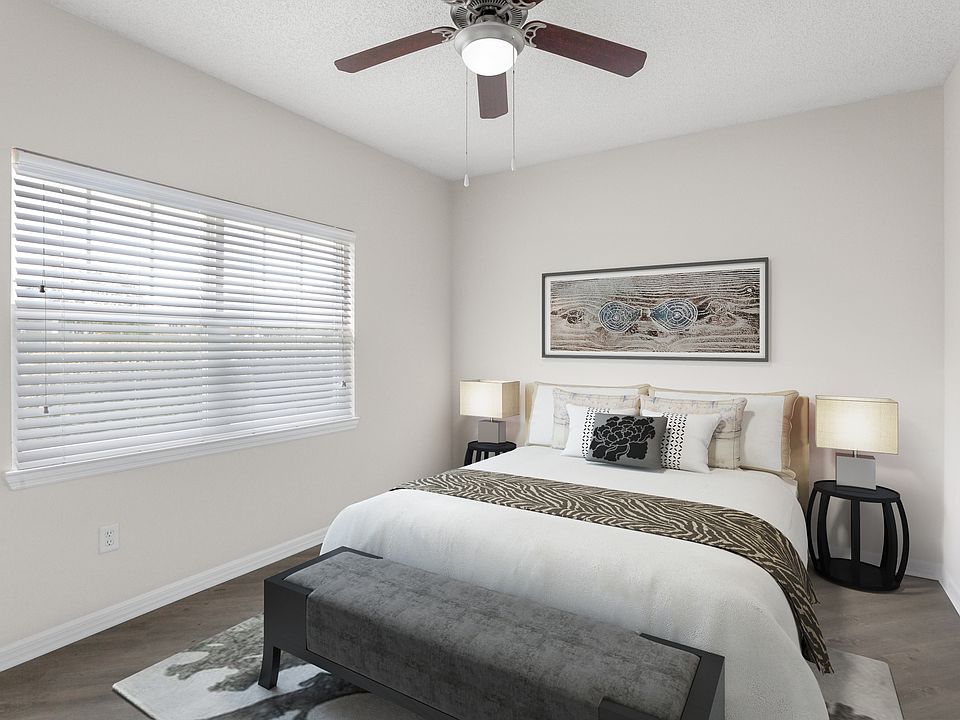 Retreat to a bedroom built for relaxation.