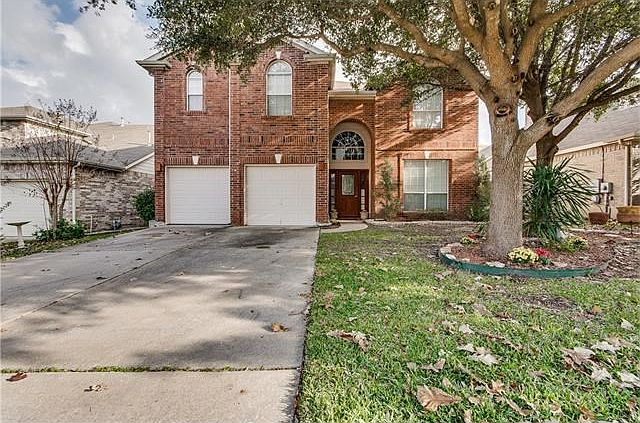 Beautiful 2-story brick home in Ranch at Cypress Creek.