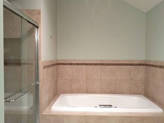 Jetted tub and separate show