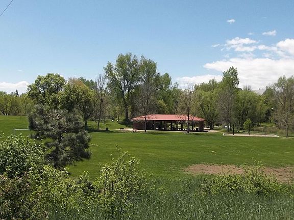 Picnic area and walking trails across from building