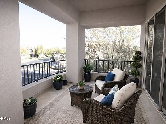 Elegant private balcony extending from living and bedroom spaces, designed for seamless indoor-outdoor living.