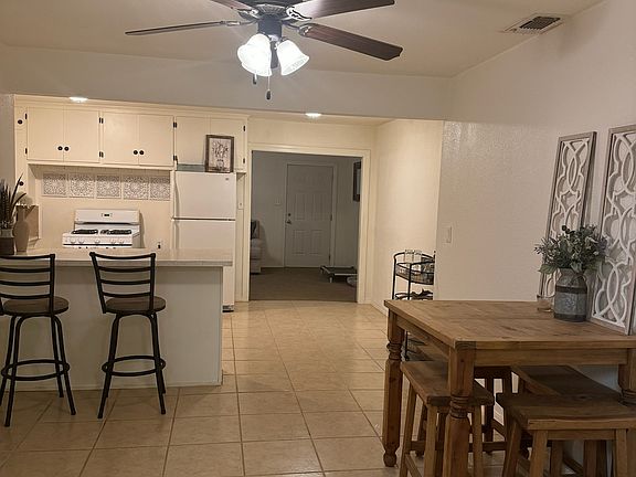 Dining room and kitchen.