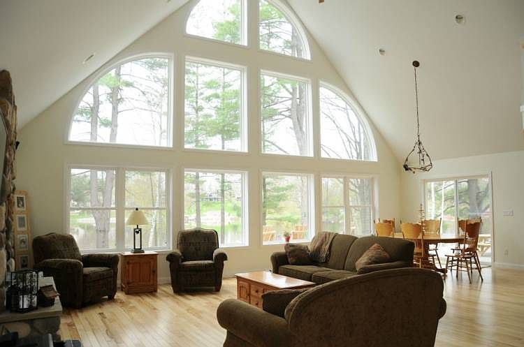 View the afternoon sun and gorgeous sunsets from the cathedral ceiling living room.