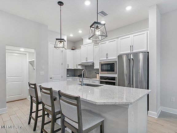 3rd image of 11313 BARRIER BEACH Place