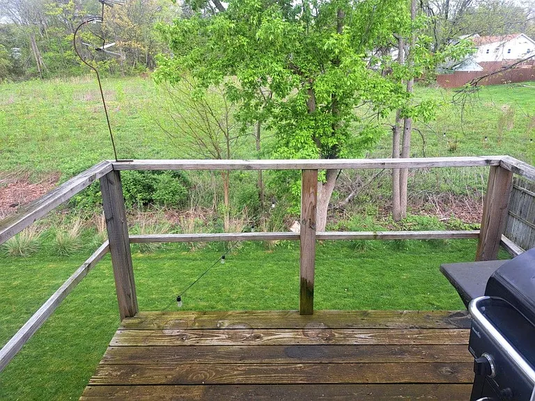 View of field behind the house. Deck is perfect for a grill.