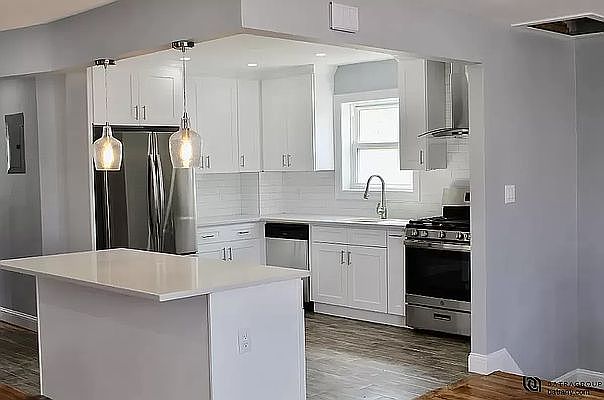 1st image of 1311 E 92nd St #1