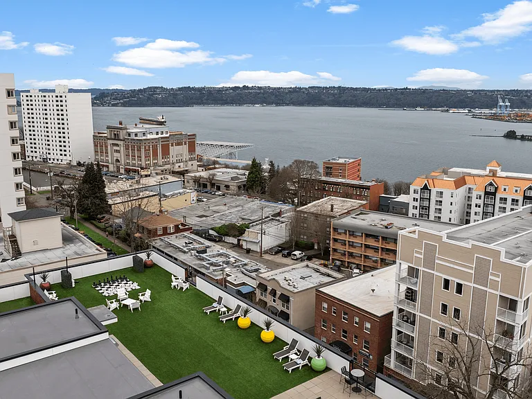 Rooftop terrace with panoramic downtown Tacoma and waterfront views.