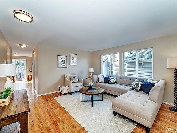 Upgrades to this home include all new hardwood flooring, carpet, vinyl, paint, and fixtures.