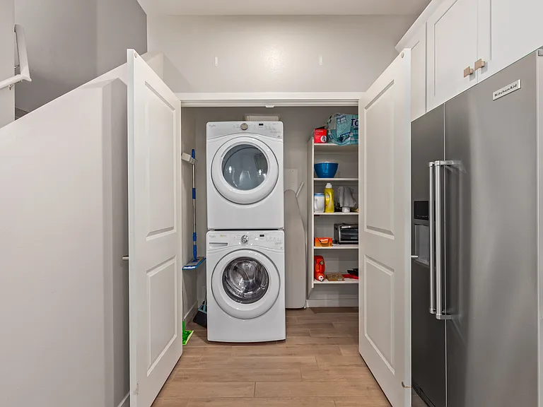 Full size washer & dryer in large closet
