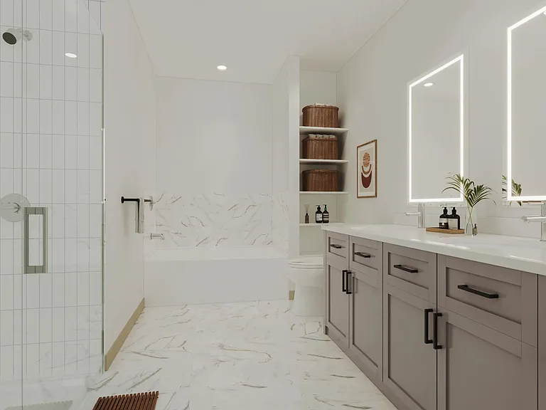 A spacious bathroom with dual vanities, backlit mirrors, a glass-enclosed shower, and a soaking tub for a clean, modern finish.