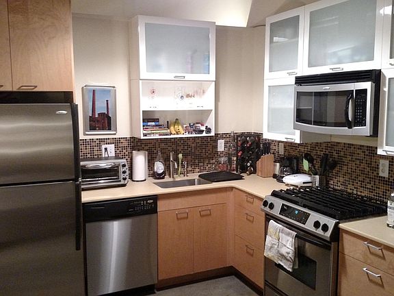 Kitchen with stainless steel appliances.