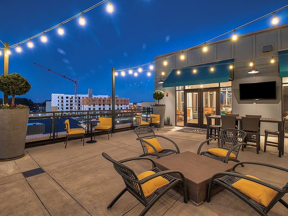 Our outdoor pavilion with TVs and dining areas